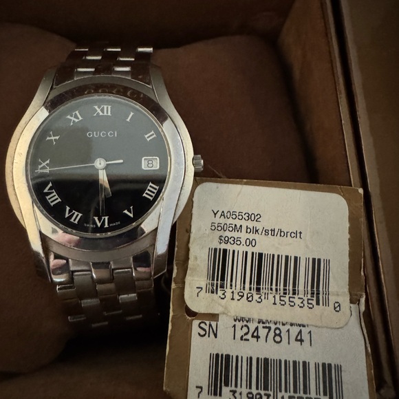 GUCCI black stainless steel watch with date.